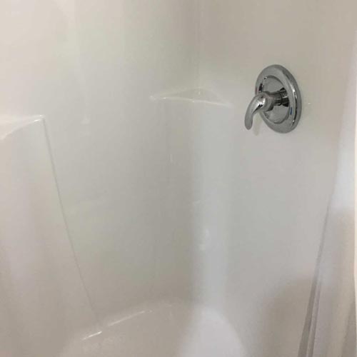 Shower stall in Stone restroom/shower trailer
