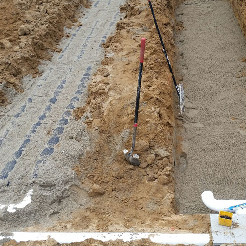 Sand filter system being installed