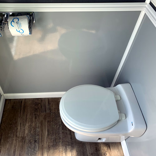 Toilet in restroom trailer